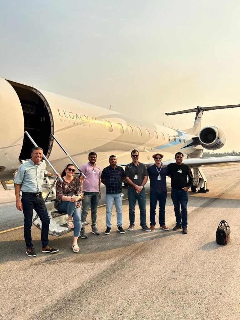 Air Kalinga Flight Crew and Passengers beside Aircraft
